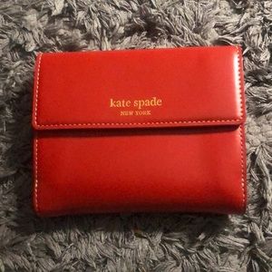 Kate spade red and gold wallet